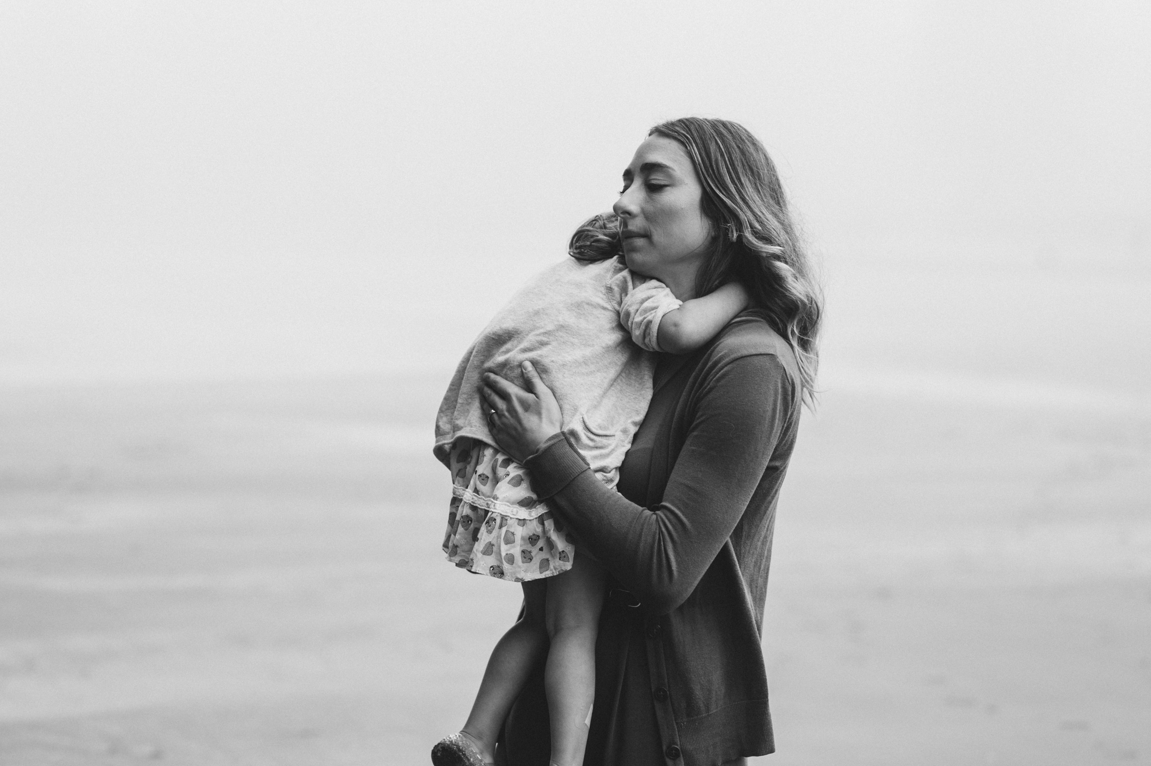 Mother comforts child through